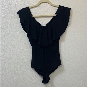 Black off the shoulder ruffle bodysuit